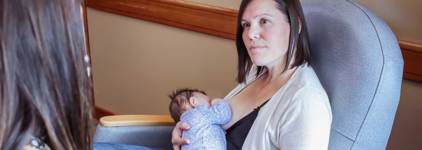 Parent and baby breastfeeding