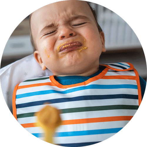 baby rejecting spoon feeding